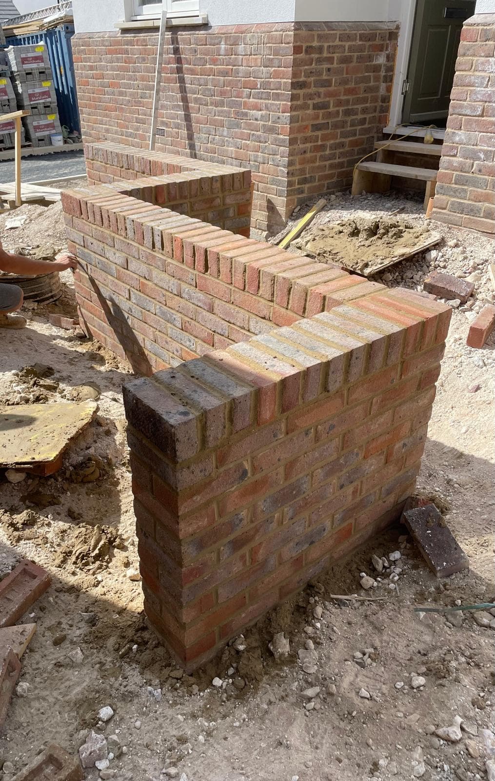 Garden walls built to the same standard as the home itself — precise brickwork that adds structure and lasting value to every outdoor space.